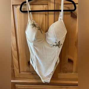 Luxurious velvet bodysuit with sequin stars. Size XXL but fits more like an XL.